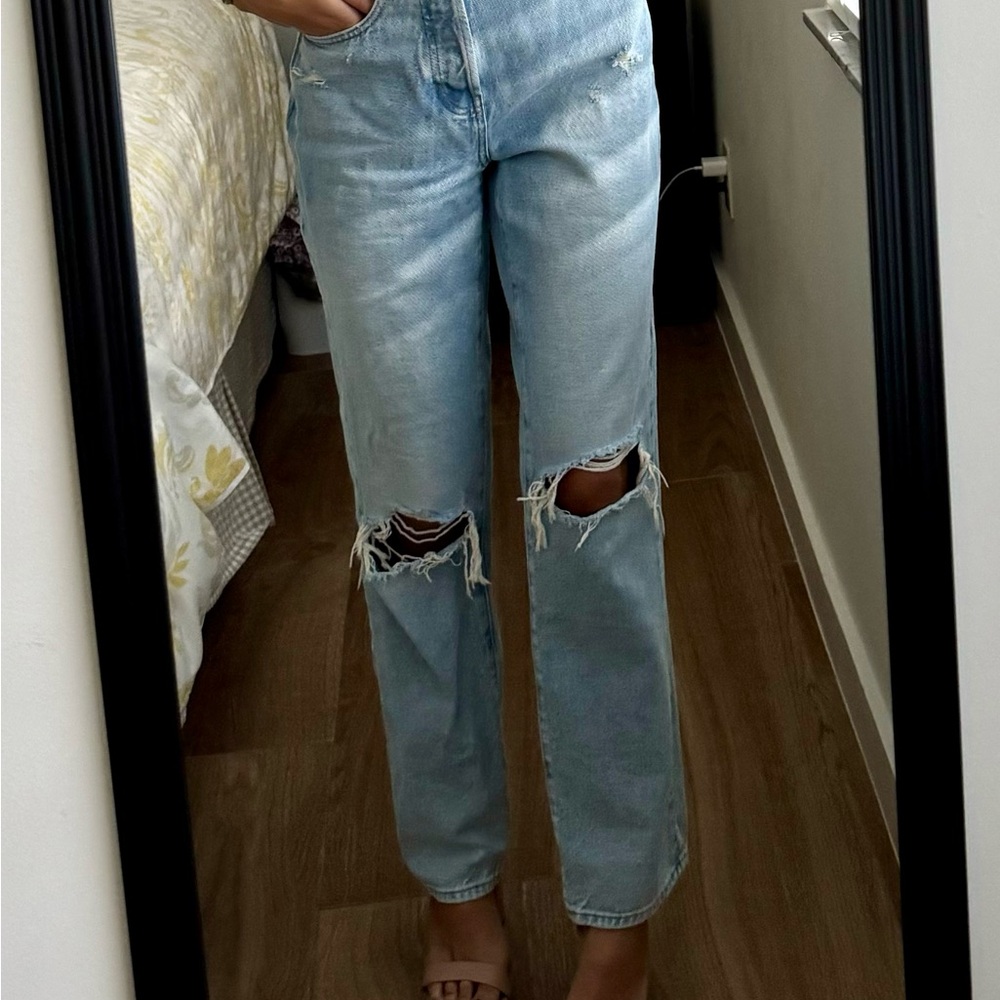Light blue jeans, versatile for tennis or heels, perfect condition